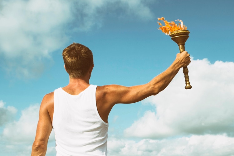 Man holding the olympic torch